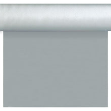 Eine Rolle Dunisilk Tete a Tete 0,4x24m silber von Duni GmbH liegt teilweise ausgerollt mit glatter Oberfläche - ideal für elegante Tischdekoration. Die hochwertige Tischdecke (Packung 1 Stück) wird oben im Bild präsentiert.
