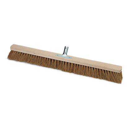 The Nölle Profi Brush hall broom natural coconut with metal handle holder Ø 24 mm from Nölle Profi Brush Bürsten- & Pinseltechnik e.K. is depicted on a white background and features natural coconut bristles and a sturdy metal handle holder.
