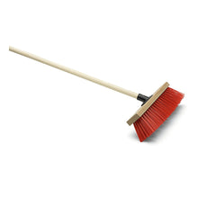 The Nölle Profi Brush Street Broom Elaston Power Stick, 40 cm with a 140 cm long handle from Nölle Profi Brush Brush & Paint Technology e.K., has bright red Elaston bristles and a light brown, rectangular head, depicted diagonally on a white background.