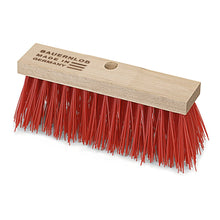 The Nölle Profi Brush street broom Elaston Bauernlob from Nölle Profi Brush Bürsten- & Pinseltechnik e.K. has a wooden head with dense red Elaston bristles, a central handle hole, and the print "BAUERNLOB MADE IN GERMANY".