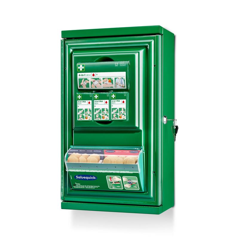 The green Cederroth First Aid Cabinet Mini (Metal) by Orkla Wound Care AB (W 260 x H 440 x D 170 mm) features storage compartments, illustrated instructions, a transparent Salvequick bandage panel, and a key lock on the right side.