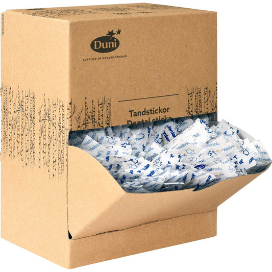 Eine braune Spenderbox aus Pappe mit der Aufschrift "Duni GmbH Zahnstocher Neutral Holz 50 | Packung (1000 Stück)" enthält einzeln verpackte Holzzahnstocher in weißer und blauer Verpackung, von denen einige durch die geöffnete Frontklappe sichtbar sind.