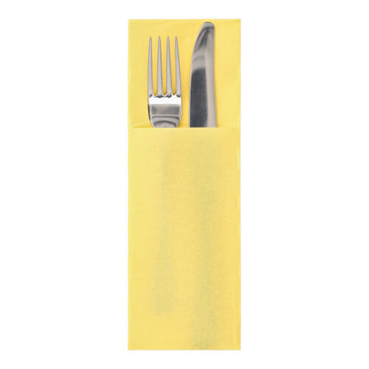 A silver fork and a silver knife are in yellow PAPSTAR 50 napkins "DAILY Collection" 48 cm x 30 cm with cutlery fold by PAPSTAR GmbH, folded into a pocket to elegantly store the cutlery.