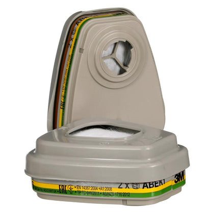 The image shows two 3M™ Filter Set 6004-1 ABEK1P3 Combination Filter Cartridges (2x6059, 2x5935, 2x501) from 3M Deutschland GmbH with colored bands and printed labels for respirator masks; one is standing, the other is lying.