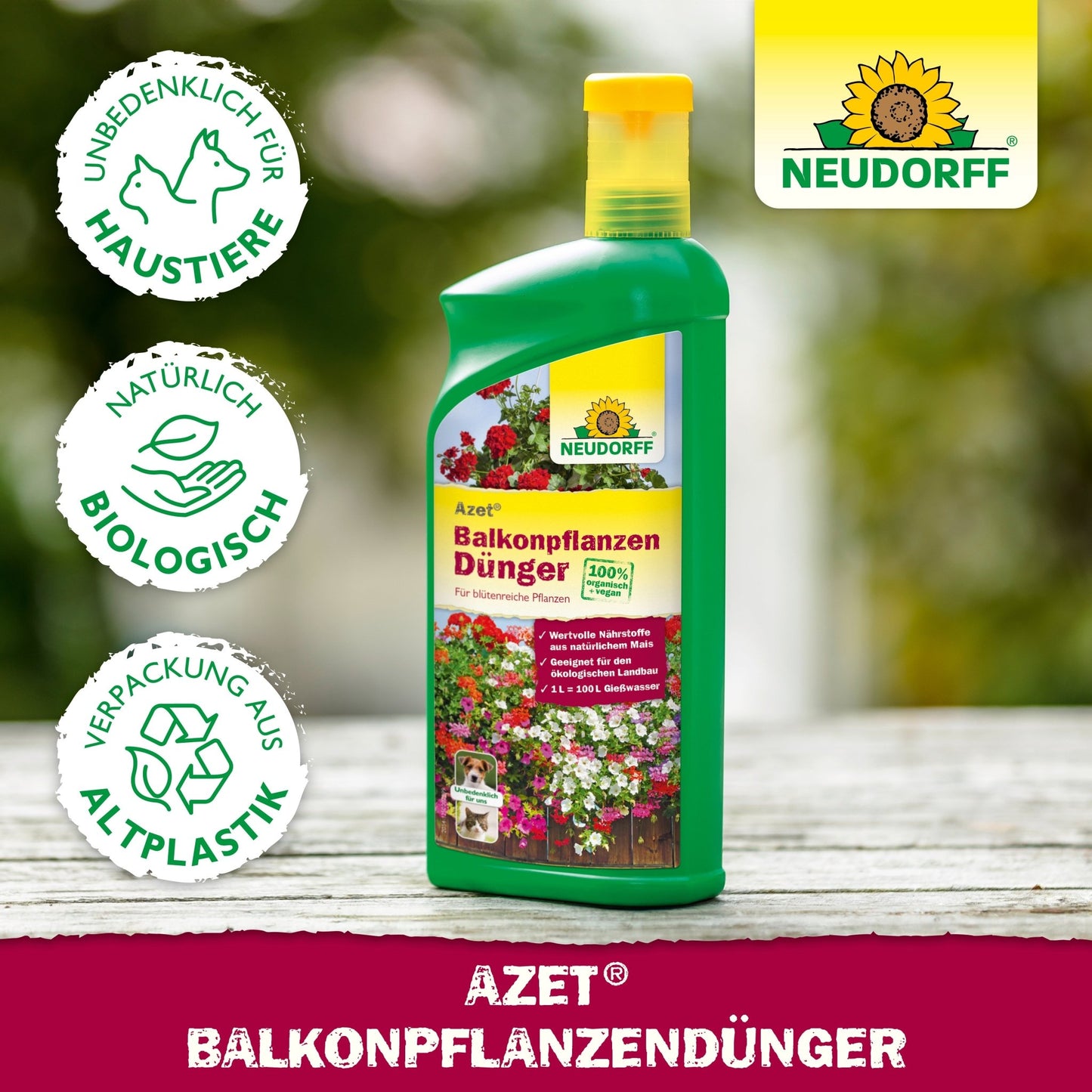 On a table stands a bottle of Neudorff Shop Azet Liquid Balcony Plant Fertilizer with symbols for pets, organic, and bioplastic; in the background blooming summer flowers, window boxes, and the Neudorff logo.