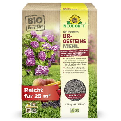 A box of Neudorff's UrgesteinsMehl from the Neudorff Shop stands upright and displays pictures of hydrangeas, apples, and grass. The 2.5 kg package is sufficient for 25 m² and is intended to improve soil fertility.
