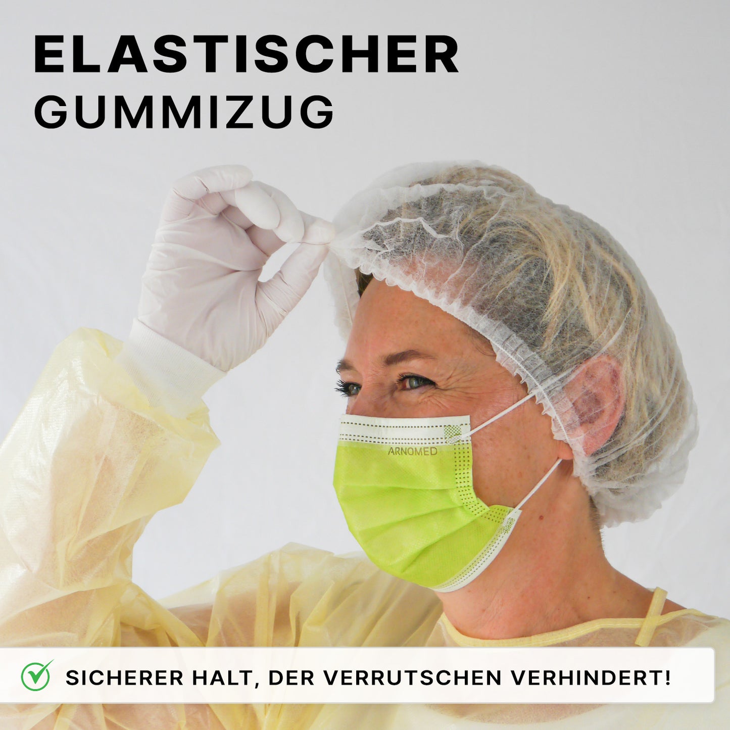 A person with a disposable gown, gloves, and green mask adjusts their ARNOMED COVER PP CLIP CAP disposable clip cap made of PP fleece (52cm, ARNOWA GmbH). Text: "Elastic rubber band" and "Secure fit that prevents slipping!".