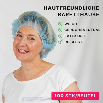 A woman in a light blue ARNOMED COVER PP-BARETTHAUBE by ARNOWA GmbH smiles at the camera. The text highlights the skin-friendly, soft, odorless, latex-free, and tear-resistant properties. Label: "100 PCS/BAG" - ideal for the hygiene sector.