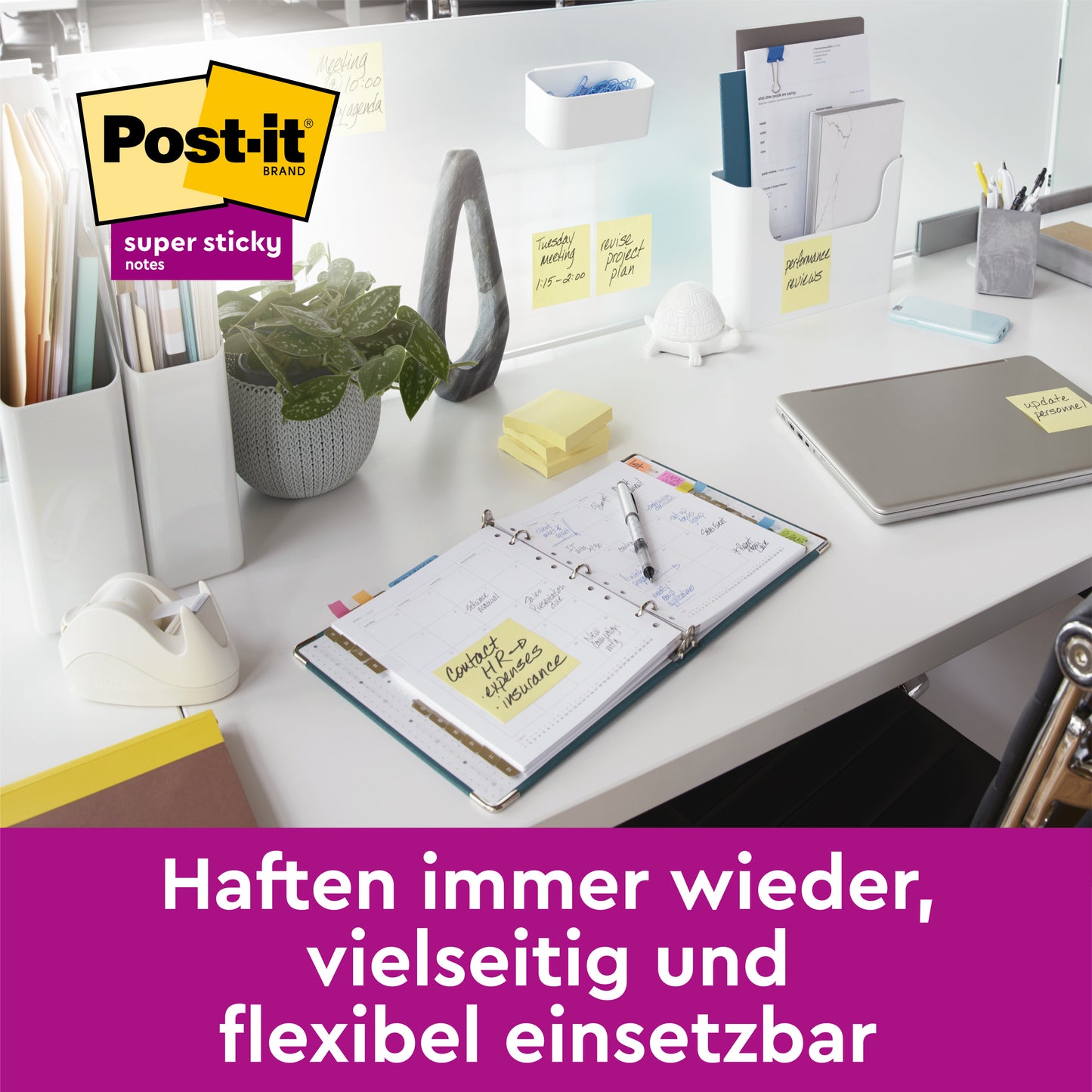 On a tidy office desk with a laptop, planner, and supplies, the 3M Deutschland GmbH Post-it® Super Sticky Notes Yellow (47.6x47.6 mm), PEFC-certified, 90 sheets/block, 21+3 free in the pack are used - highlighting their sustainable versatility and reusability.