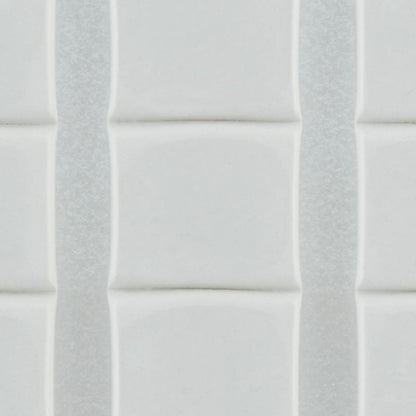 Close-up of white, glossy, rectangular tiles with slightly raised edges, arranged vertically with thin grout lines - securely fastened with 3M Deutschland GmbH Scotch-FIX™ Removable Adhesive Pads 301008C36-P (11 mm x 15 mm, 36 pieces/pack).