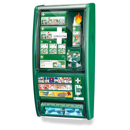 The Cederroth first aid & burn station from Orkla Wound Care AB is a green, wall-mounted first aid station with compartments for burn gel, bandages, soft foam bandages, and an illustrated guide on the front.