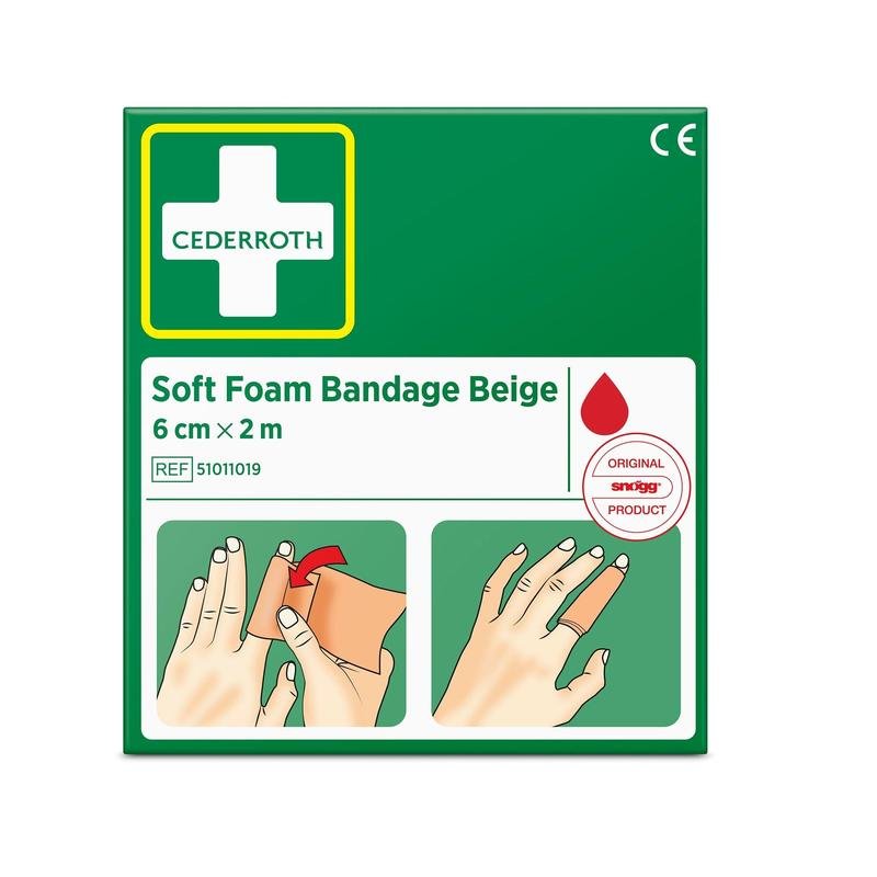 A green box with the inscription "Cederroth soft foam bandage beige 6 cm x 2m | Package (1 piece)" from Orkla Wound Care AB has a white cross logo, the reference 51011019, and two illustrated instructions for applying the beige bandage to a hand.