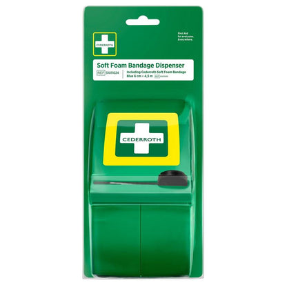 The Orkla Wound Care AB Cederroth Soft Foam Bandage Dispenser blue (1 piece) comes in its packaging with a white cross on green, clear labeling and contains a roll of blue, self-adhesive bandages for initial wound care.