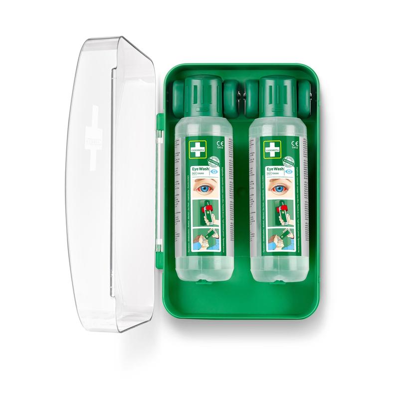 The Cederroth Eye Wash Cabinet 1x1 by Orkla Wound Care AB is a green plastic case with a transparent lid containing two "Eye Wash" bottles, each labeled with an eye symbol, instructions, and a white cross - ideal for any first aid kit.