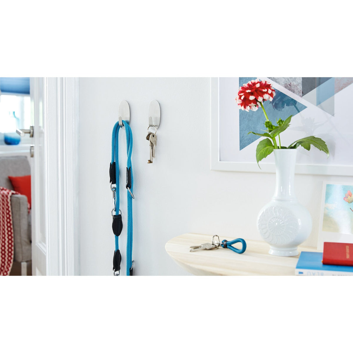 tesa Powerstrips Haken L Metall Oval, weiß – Anwendung