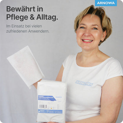 A smiling woman in a white ARNOVA shirt holds a backpack and a pad. The German text highlights: ARNOMED disposable wash gloves Spunlace with PE, water-repellent (50 pieces) by ARNOWA GmbH - appreciated by many satisfied users for care and daily use.