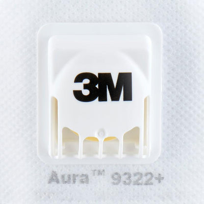 Close-up of a white 3M™ Aura™ Comfort Cool Flow™ Particulate Respirator 9322+, FFP2, with valve from 3M Deutschland GmbH, showing the brand valve and the text "Aura 9322+" on the mask fabric.