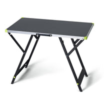 The Nölle Profi Brush Workbench Prestige (100 x 60 cm) from Nölle Profi Brush Bürsten- & Pinseltechnik e.K. is a stable, versatile, foldable workbench with a rectangular black surface, metal frame, and reinforced light green corners.