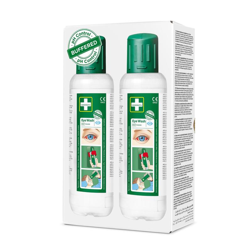 A white box contains two 500 ml bottles of Cederroth Eye Wash from Orkla Wound Care AB, each with a green cap and eye wash instructions. The box shows a green "BUFFERED" pH graphic - ideal for eye accidents. The package contains 2 pieces.