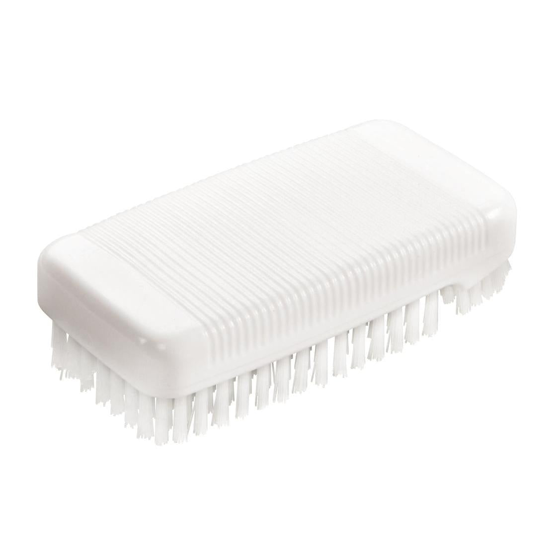 The Diversey hand wash brush, white, hard (97 x 47 mm), features hard bristles and a ribbed plastic handle. This nail brush (1 piece) is ideal for effective cleaning and is presented on a white background.