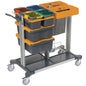The TASKI Midi Closed for Jonmaster from Diversey Deutschland GmbH & Co. OHG is a cleaning cart with closed drawers for optimal hygiene, ideal for pre-wetting cleaning textiles, and features four wheels for easy mobility.