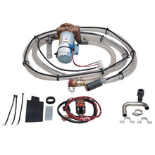 The emptying pump set for swingo 4000 & 5000 from Diversey Deutschland GmbH & Co. OHG contains hoses, clamps, cables, plugs, a metal bracket, cable ties, a switch, and mounting material on a white background.