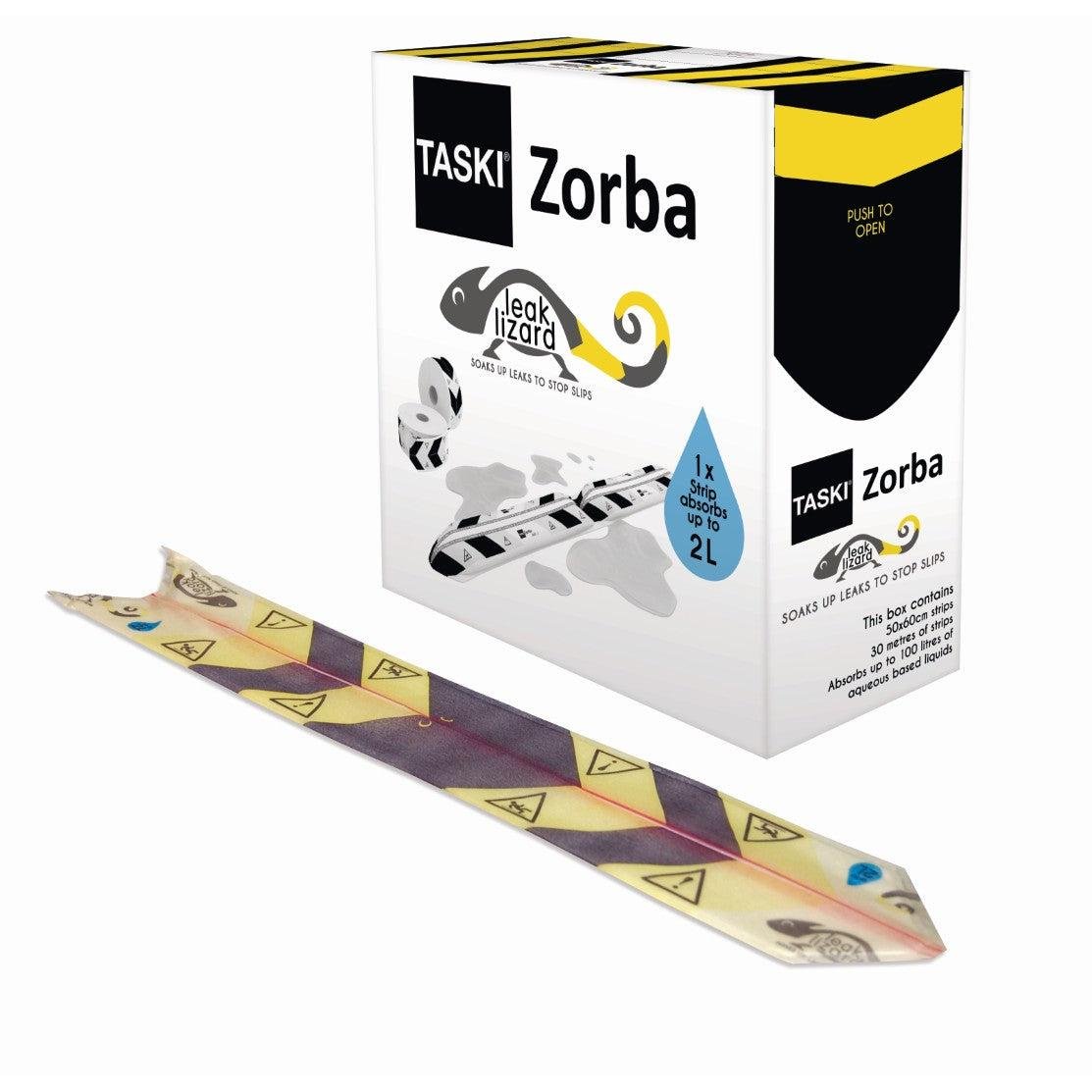 Behind a yellow-white highly effective absorption strip (1 carton = 50 x 60 cm) hides a box of TASKI Zorba Leak Lizard from Diversey Germany. The package claims it absorbs up to 2 liters for quick leak removal.