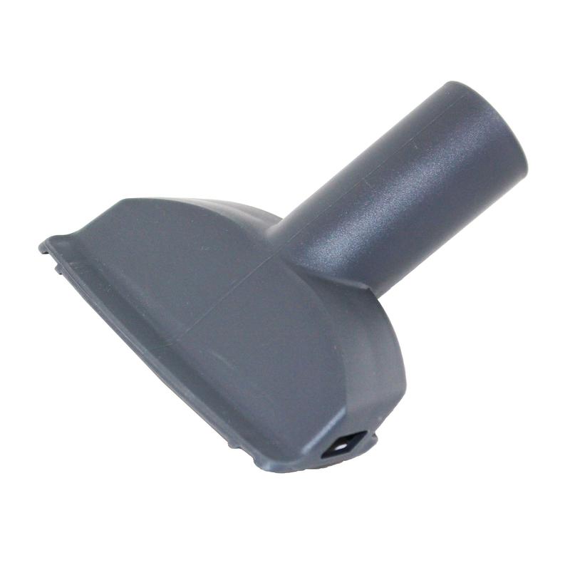 The TASKI AERO upholstery nozzle 38mm by Diversey Deutschland GmbH & Co. OHG is a grey vacuum cleaner attachment made of plastic with a wide, flat nozzle for efficient cleaning of upholstered furniture. Suitable for TASKI AERO, package contains 1 piece.