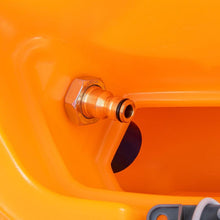 A close-up of a brass quick coupling with a hex nut on orange plastic, showing the Diversey TASKI Aqua fill stop automatic shut-off valve that prevents the fresh water tank from overflowing. A gray plastic part appears at the bottom right.