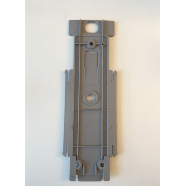 The Dr. Schnell back panel for dispenser Euro bottle by DR.SCHNELL GmbH & Co. KGaA is a rectangular, light gray plastic piece with raised areas, circular holes, and grooves for dispenser attachment, depicted on a white background.