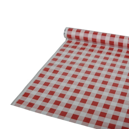 A roll of Starpak tablecloth foil, 50 m x 80 cm in red checkered pattern, is partially unrolled on a flat surface. The material is plastic foil.