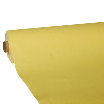 A large roll of light yellow PAPSTAR tablecloth, tissue "ROYAL Collection" from PAPSTAR GmbH, is partially unrolled, showing its smooth, slightly textured surface and high-quality tissue construction wrapped around a sturdy cardboard core.