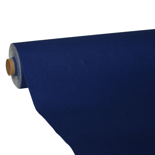 A large roll of dark blue PAPSTAR tablecloth, Tissue 'ROYAL Collection' by PAPSTAR GmbH, is partially unrolled, revealing its premium quality as it wraps around a cardboard tube on a plain white background.