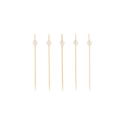 Five PAPSTAR 100 finger food - picks from PAPSTAR GmbH, each with a small clear pearl at the top end, are arranged in a straight, horizontal line on a plain white background.