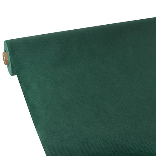 A roll of Starpak tablecloth, fabric-like, fleece 'Soft Selection' in solid dark green, is partially unrolled at an angle, making the cardboard tube visible at one end. The background is simple and clear.