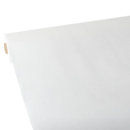 A close-up of a roll of Starpak tablecloth, fabric-like, fleece "Soft Selection", partially unrolled on a flat surface, with the cardboard tube core visible on the left.