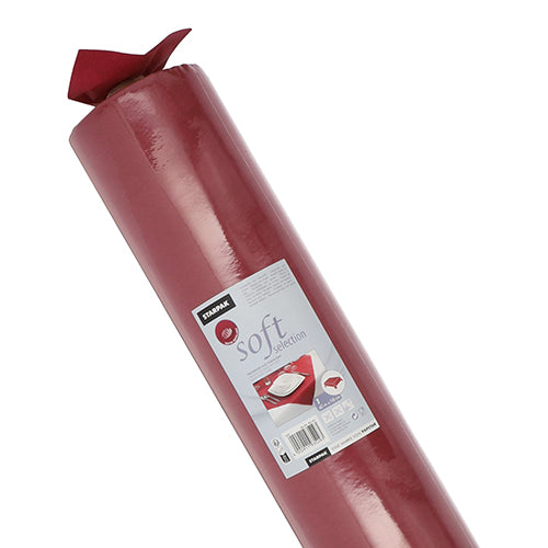 A large roll of Starpak tablecloth, fabric-like fleece “Soft Selection”, is labeled with a barcode, the brand name Starpak, and an image of the tablecloth in use.