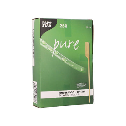 A green box labeled "PAPSTAR 250 finger food skewers pure" by PAPSTAR GmbH contains 250 bamboo skewers (9 cm), ideal for finger food and party buffets. The packaging features a skewer image.