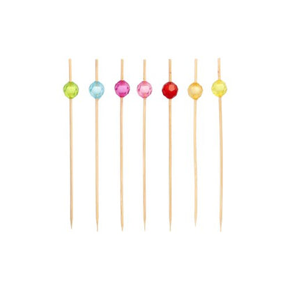 Six PAPSTAR 100 finger food picks from PAPSTAR GmbH are arranged in a row, each with a differently colored ball on a white background - perfect for stylish serving.