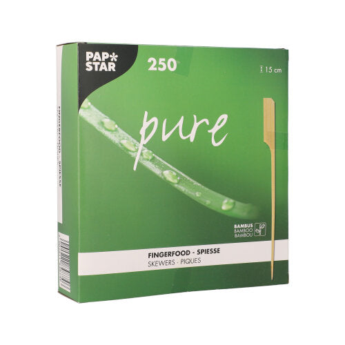 A green box labeled "PAPSTAR 250 finger food skewers 'pure'" by PAPSTAR GmbH contains 250 bamboo skewers (15 cm), perfect for finger food at party buffets. The box shows a skewer image and a green leaf with water droplets.