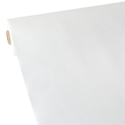 The Starpak tablecloth, fabric-like, fleece “soft selection” shows a smooth texture and clean edges when partially unrolled, with the cardboard core on the left side.