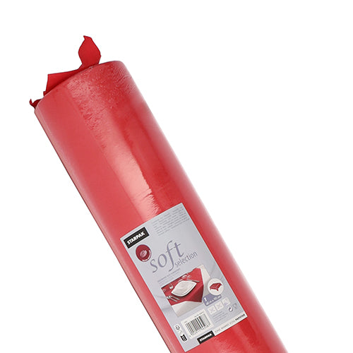 A roll of red Starpak tablecloth, fabric-like fleece "Soft Selection", is depicted slightly tilted on a white background. The packaging shows the Starpak brand as well as product details and highlights the fabric-like texture.