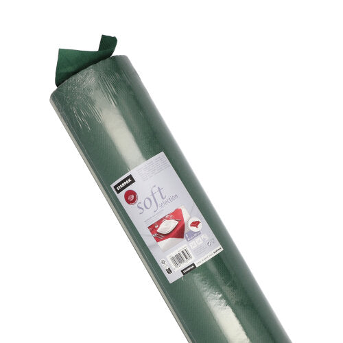 A rolled green foam pad, wrapped in plastic packaging with a label showing the brand "Starpak", the product name "Tablecloth, fabric-like, fleece 'soft selection'" and an image of the pad used under the flooring.