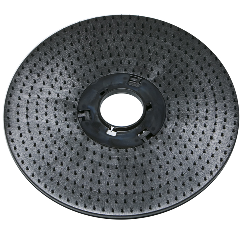 The Diversey Deutschland GmbH & Co. OHG pad holder (43 cm) for swingo 3500 is a round, black plastic floor pad holder with a textured surface, short bristles, and a central hole for attaching cleaning and polishing pads. The package contains 1 piece.