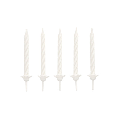 Five unlit white PAPSTAR birthday candles 6 cm with holder (PAPSTAR GmbH, blister pack of 24 pieces) are arranged in a straight horizontal line on a solid white background.