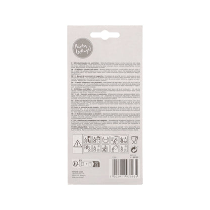 On the back of a light gray, rectangular packaging of PAPSTAR GmbH are multilingual texts, warning symbols, care instructions, barcode, and the "Party! Edition!" logo. Describes the PAPSTAR birthday candles 6 cm, white with holder | blister (24 pieces) for celebrations.