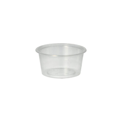 The Starpak 50 dressing cup, PP round Ø 7.1 cm transparent by Starpak features smooth sides and a slightly rolled rim, ideal for catering service, depicted against a plain white background.
