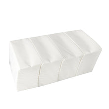 A stack of Starpak 480 cutlery bags made of Airlaid 40 cm x 33 cm with cutlery fold ensures a hygienic presentation and is neatly stacked against a white background.