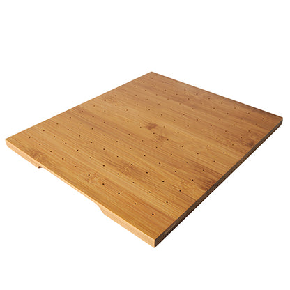 The PAPSTAR holder for finger food picks is a 25x30 cm rectangular bamboo tray with small, evenly distributed holes, a smooth surface, and a rim notch - ideal for the stylish presentation of finger food. Brand: PAPSTAR GmbH.