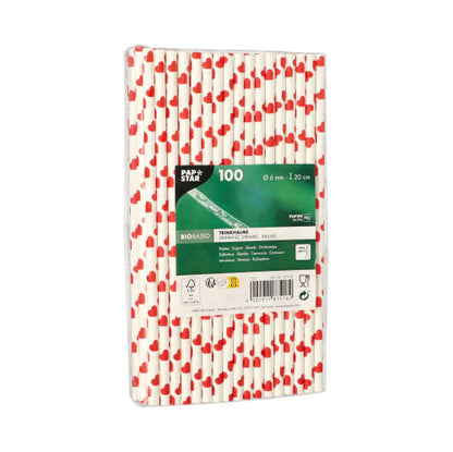 A pack of 100 PAPSTAR straws, paper Ø 6 mm from PAPSTAR GmbH with a red heart pattern, individually wrapped in plastic. The green label contains information about the brand, the eco-friendly bio-based material, and the size.